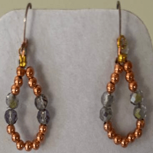 Pair of beaded earrings with  tones of bronze and silver